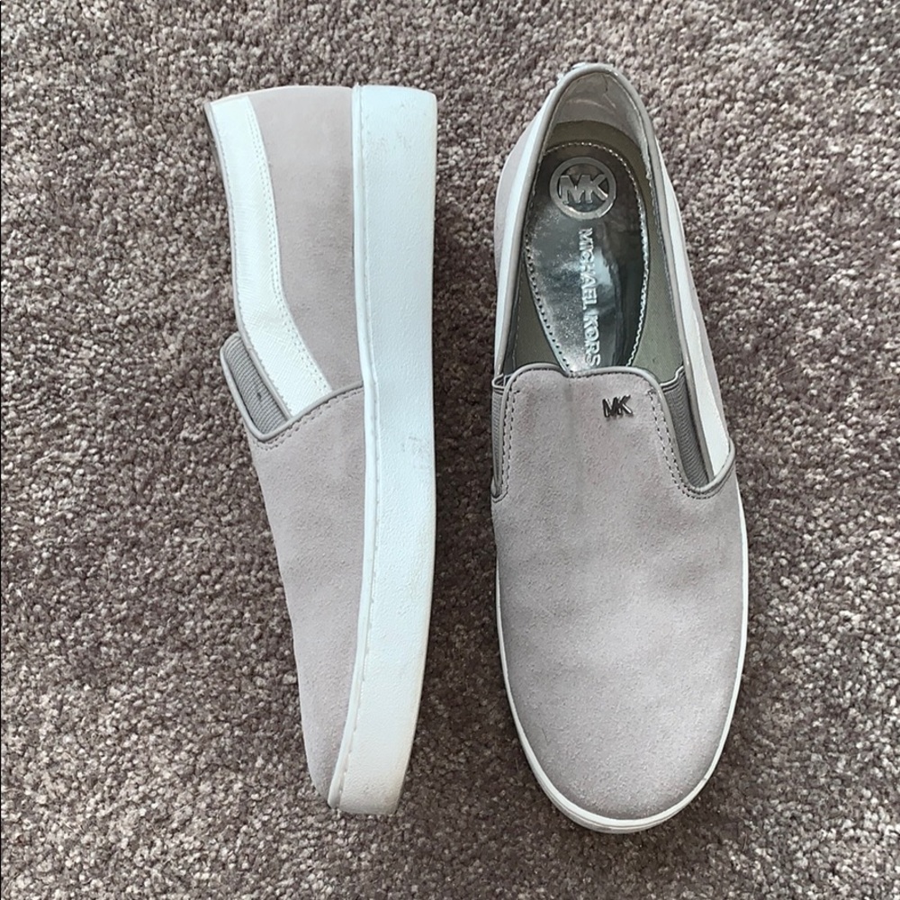 Gray and white Michael Kors shoes